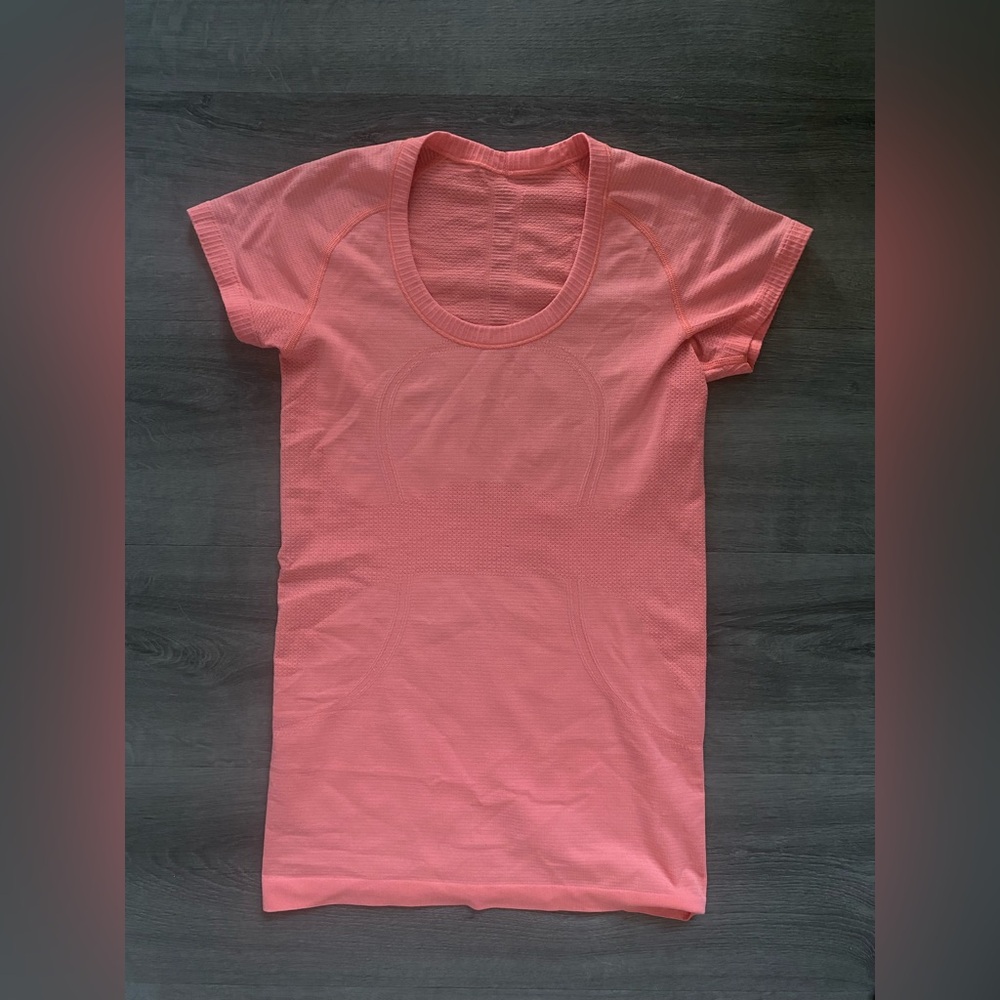 Coral pink lululemon short sleeve swiftly top